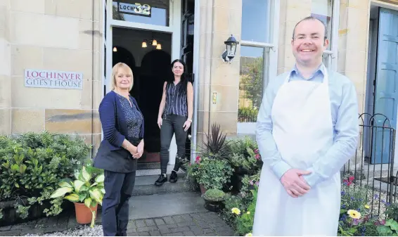  ??  ?? On a knife- edge Chair of the Ayrshire B& B Associatio­n and Proprietor of Ayr’s Lochinver Guest House Sinclair Williamson, right, with staff Diane Worrall, left, and Ewa Lesnyczyr