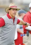  ?? ROBERT SUTTON/ALABAMA PHOTO ?? Alabama football coach Nick Saban is happy to have a 10th assistant, which will be allowed for FBS teams starting next year, but he is not as pleased about the eliminatio­n of two-a-day practices.