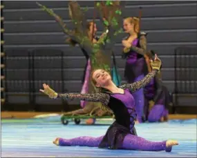  ?? PETE BANNAN – DIGITAL FIRST MEDIA ?? The Unionville Indoor Color Guard performs “The Enchanted Forest.” The group practices three times a week for three hours per night and compete every weekend of the winter season.