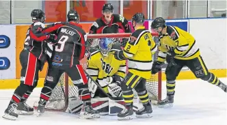  ??  ?? Dundee Tigers (yellow) lost 7-1 to Paisley Pirates in another Scottish National League quarter-final first-leg tie in Dundee.
