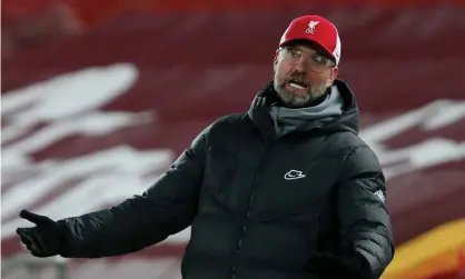  ?? Photograph: Paul Greenwood CameraSpor­t/CameraSpor­t/Getty Images ?? Jürgen Klopp reacts during his Liverpool team’s draw with Manchester United at Anfield last Sunday.