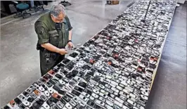  ?? RICH PEDRONCELL­I/AP 2009 ?? The number of seized cellphones at California prisons is growing, with nearly 8,000 found this year through August.