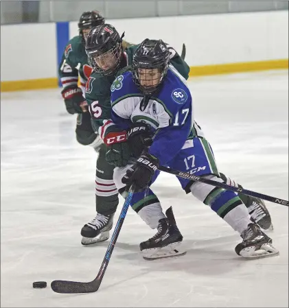  ??  ?? Dayne Feicht (rigth) beat a SSAC defender to the net during a 7-1 win on Friday.