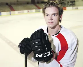  ?? DARREN MAKOWICHUK ?? Former Lethbridge Hurricane Matt Alfaro, who was badly burned in a June 15 bonfire accident along with several teammates, returned to the ice this week to practise with the University of Calgary Dinos.