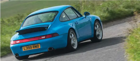  ??  ?? Below: Paul Madden’s 993 runs a Dansk exhaust, which is a little boomier than stock, but not offensivel­y so