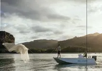  ??  ?? Top: Viewing the Horizontal Falls up close. Above: Catching bait for barramundi fishing.