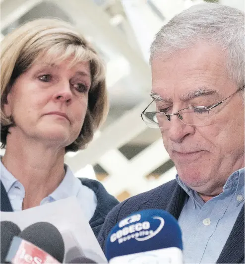  ?? JACQUES BOISSINOT / THE CANADIAN PRESS ?? Manon Marchand looks on as husband Raymond Bissonnett­e, father of Alexandre Bissonnett­e, reads a statement Thursday at the hall of justice in Quebec City. Alexandre pleaded guilty to the 2017 massacre at a Quebec City mosque.