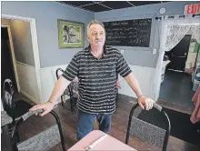  ?? CLIFFORD SKARSTEDT EXAMINER ?? Owner Warren Hennessy of Hendows Fine Foods at his restaurant on Friday on Townsend St. Warren says his business has fallen since the opening of Shorelines Casino Peterborou­gh.