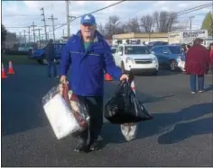  ?? PETE BANNAN – DIGITAL FIRST MEDIA ?? “It’s the right thing to do,” said volunteer William Murphy of West Chester, who came out to Good Will Fire Company at 11a. m. Sunday and stayed the rest of the day helping others unload donations.