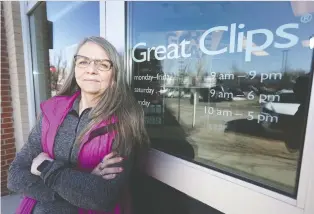  ?? JIM WELLS ?? Pennie Boyce, who co-owns five Great Clips hair salons in Calgary, says she is being forced to pay full rent during the coronaviru­s crisis. There is federal aid available, if landlords apply to join.