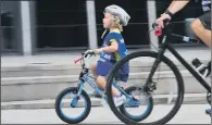  ??  ?? PEDAL TO THE METTLE: Cyclists of all ages tackled the 6km ride which started in Millennium Square and took in Woodhouse Moor.