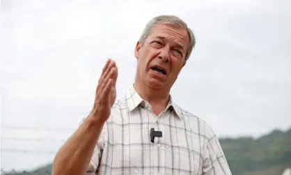  ?? Photograph: Matthew Childs/Reuters ?? Nigel Farage, who criticised the RNLI for saving refugees, speaks during a visit to Dover harbour.