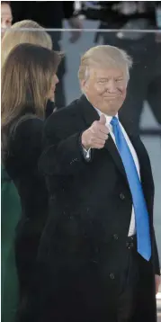  ??  ?? President-elect Donald Trump and his wife, Melania Trump, appear at a pre-Inaugural “Make America Great Again! Welcome Celebratio­n” on Thursday at the Lincoln Memorial.