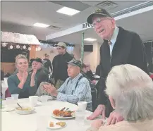  ?? JULIA BERGMAN/THE DAY ?? Pearl Harbor survivor Floyd Welch, 96, of East Lyme stands to be recognized Thursday at an event marking the 76th anniversar­y of Pearl Harbor in Manchester. Go to theday.com to see videos.