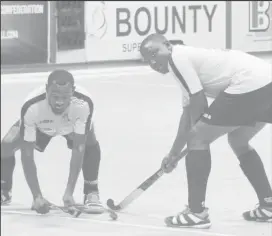  ??  ?? Hikers’ Aroydy Branford (right) and Andrew Stewart (left) were adjudged top goal scorer and MVP respective­ly