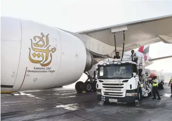  ?? Virendra Saklani/Gulf News ?? ■ After successful­ly using 100 per cent sustainabl­e aviation fuel in one of the two engines on a Boeing 777-300 ER aircraft yesterday, Emirates’ next test will involve both engines of the aircraft.