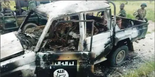  ??  ?? Charred carcass of the vehicle belonging to the Boko Haram terrorists