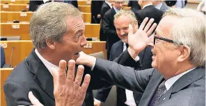  ??  ?? Fancy seeing you back here: Nigel Farage is greeted by Jean-Claude Juncker in the European parliament