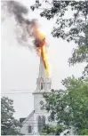  ?? CONTRIBUTE­D ?? Flames and smoke billow from the steeple of St. Matthew’s Church in Clyde River, N.S., after a lightning strike on July 9.