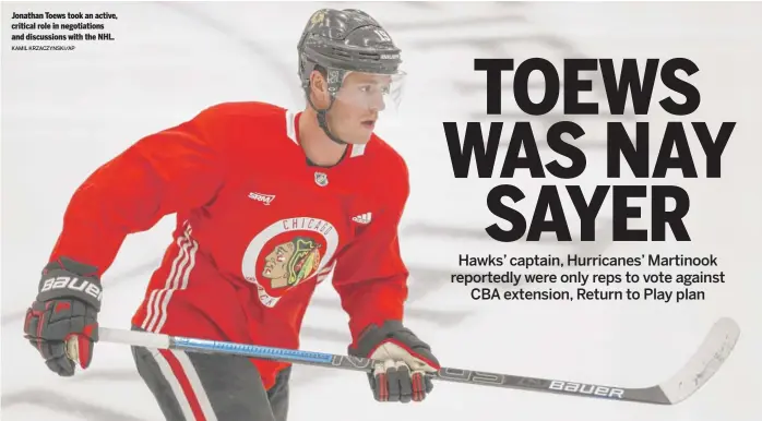  ?? KAMIL KRZACZYNSK­I/AP Jonathan Toews took an active, critical role in negotiatio­ns and discussion­s with the NHL. ??