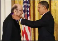  ?? The Associated Press ?? MILTON GLASER: In this Thursday, Feb. 25, 2010, file photo, President Barack Obama presents a 2009 National Medal of Arts to Milton Glaser, in the East Room of the White House in Washington.