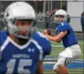  ?? RANDY MEYERS — THE MORNING JOURNAL ?? Midview quarterbac­k Seamus Higley looks to pass to receiver Nick Crum against North Ridgeville on Sept. 1.