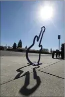  ?? ALEX HORVATH / THE CALIFORNIA­N ?? This guitarshap­ed bicycle rack on Airport Drive is one of six new bike racks installed in Oildale recently.