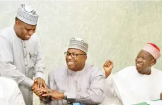  ??  ?? From left: Sokoto State Governor Aminu Waziri Tambuwa; Bauchi State Governor Barr. Mohammed Abubakar, and Kano State Governor Dr. Abdullahi Umar Ganduje, during the Nigerian Governor’s Forum meeting, held over the Abuja weekend.