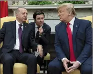  ?? AP/EVAN VUCCI ?? Turkish President Recep Tayyip Erdogan (left) and an interprete­r meet Wednesday with President Donald Trump in the White House. Trump said he wanted to thank Erdogan for “the job they’ve done,” adding that the Syrian Kurds “seem very satisfied” with the cease-fire agreement in northern Syria.