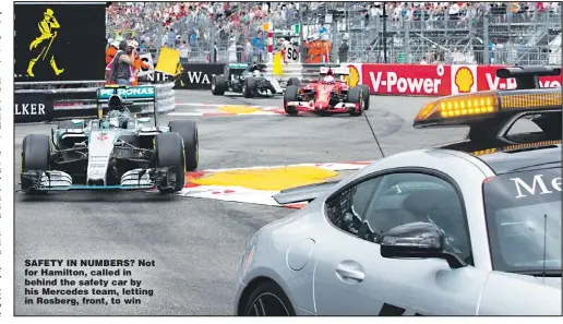  ?? Picture: GERO BRELOER ?? SAFETY IN NUMBERS? Not for Hamilton, called in behind the safety car by his Mercedes team, letting in Rosberg, front, to win