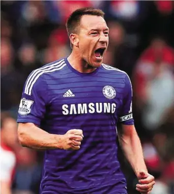  ?? AFP ?? Drawing closer to the title Chelsea defender John Terry celebrates after his side’s goalless English Premier League draw against Arsenal at the Emirates Stadium in London on Sunday.