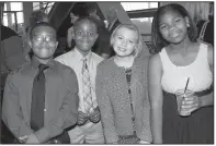  ??  ?? KIPP Students Darrius Pledger, Keaton Henderson and Kayleigh Kilgore, all of Forrest City, and Jada Sloan of Pine Bluff