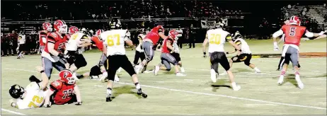  ?? MARK HUMPHREY ENTERPRISE-LEADER ?? Farmington senior tailback Caleb Williams runs the football against Prairie Grove. Williams scored a touchdown but the Cardinals were defeated, 36-13, by their rivals on Tuesday, Aug. 29, at Farmington’s Allen Holland Field.