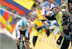  ?? CHRISTOPHE ENA/THE ASSOCIATED PRESS ?? Chris Froome crosses the finish line Saturday during the first stage of the Tour de France, an 8.7 mile, mostly flat course, which ended in Düsseldorf, Germany.