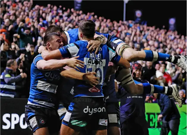  ?? PICTURE: Ryan Hiscott/getty Images ?? Tom Dunn, Ollie Lawrence and Fergus Lee-warner celebrate after Bath Rugby’s last-minute try to beat Leicester Tigers 19-18 under the lights at the Rec on Friday night
