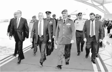  ??  ?? A handout photo provided by the Kuwaiti news agency KUNA shows Kuwaiti Army Chief of Staff General Lieutenant Mohammad al-Khodhr (centre right) receiving Mattis (centre left) upon his arrival at Kuwait’s internatio­nal airport in Kuwait City. Mattis...