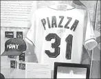  ?? Kevin Kernan ?? WELCOME BACK: The jersey Mike Piazza wore while hitting his famous post 9/11 homer will be on display at the 9/11 Museum starting Sept. 7