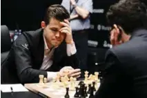  ?? FOTO: WORLD CHESS ?? NY REMIS: Magnus Carlsen klarte aldri å utnytte sine to strake partier med hvite brikker.