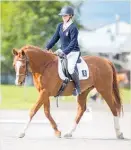  ??  ?? Eva van den Brink was junior and overall champion at the Solway College Dressage Interschoo­l.