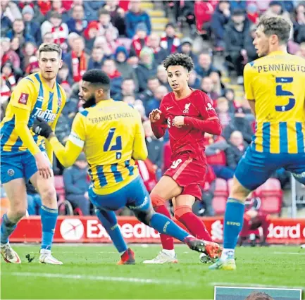  ?? ?? Seventeen-year-old Kaide Gordon levels for Liverpool against Shrewsbury.