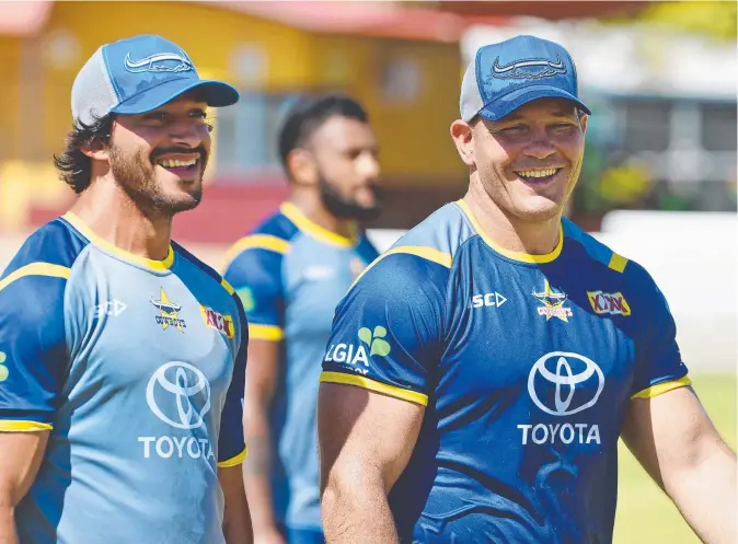  ?? THEY’RE BACK: North Queensland Cowboys co- captains Johnathan Thurston and Matt Scott at training this week. The pair have been named to play in the club’s first trial. Picture: EVAN MORGAN ??