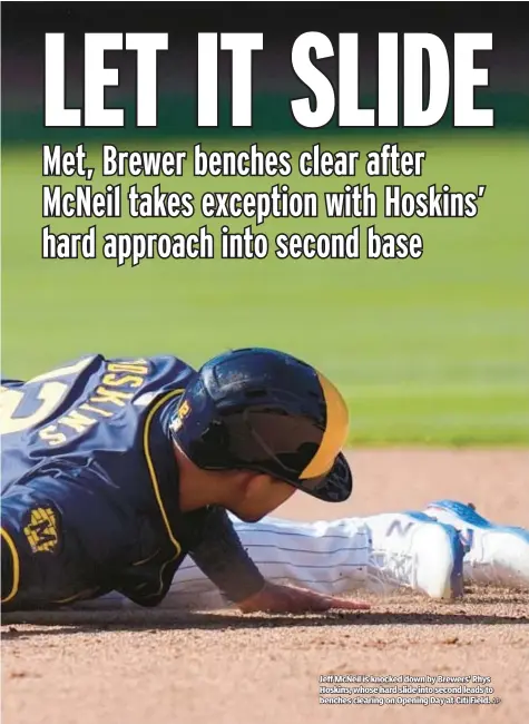  ?? AP ?? Jeff McNeil is knocked down by Brewers’ Rhys Hoskins, whose hard slide into second leads to benches clearing on Opening Day at Citi Field.