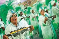  ?? AFP ?? Revellers of the Mocidade samba school perform during the first night of Rio’s Carnival at the Sambadrome on Sunday.