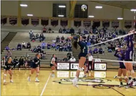  ?? NATE BARNES — THE NEWS-HERALD ?? Beaumont’s Madison Kasper hits during a D-II regional semifinal match against Wooster Triway at Stow on Nov. 2.