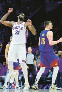  ?? DERIK HAMILTON/ AP ?? Philadelph­ia 76ers’ Joel Embiid dominated against fellow MVP candidate, Denver Nuggets’ Nikola Jokic on Saturday.