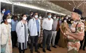  ?? — PTI ?? DG ITBP S.S. Deswal interacts with teams of healthcare profession­als and other supporting staff at a Covid care center set up at Radha Soami Beas in New Delhi on Friday.