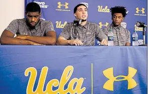  ?? AP/JAE C. HONG ?? Flanked by teammates Cody Riley and Jalen Hill, UCLA’s LiAngelo Ball reads a prepared statement Wednesday during a news conference in Los Angeles in which the players apologized for last week’s shopliftin­g incident in Hangzhou, China.