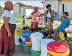  ?? Picture: MARK ANDREWS ?? RUNNING OUT: Mdantsane NU3 residents say they’ve been without water since last week. A main water pipe burst yesterday, restrictin­g flow to the township and the coast west of the city