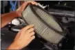  ??  ?? Replacing air filters is an inexpensiv­e way to keep vehicles performing at peak capacity.