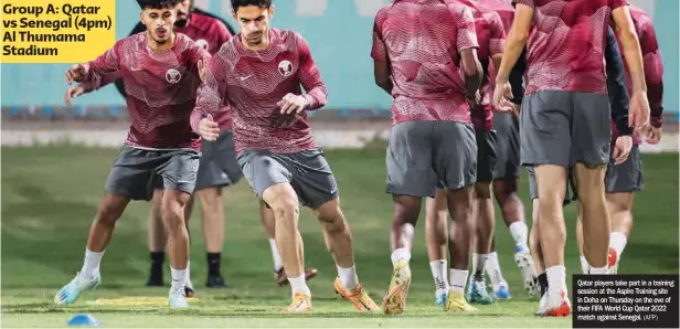  ?? (AFP) ?? Qatar players take part in a training session at the Aspire Training site in Doha on Thursday on the eve of their FIFA World Cup Qatar 2022 match against Senegal.